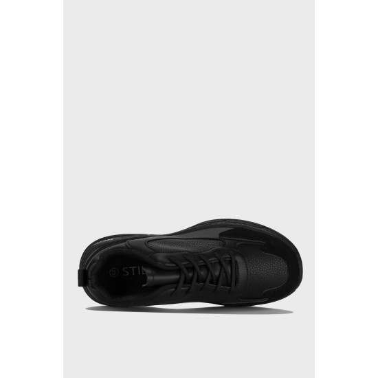 Кросівки жіночі